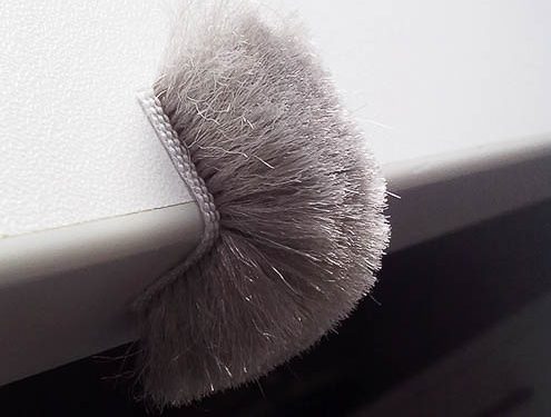 Bürstendichtung über Kante